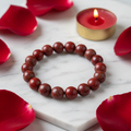 Root Chakra Red Jasper bracelet on white marble